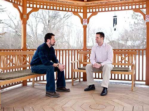 Adults Talking in Gazebo